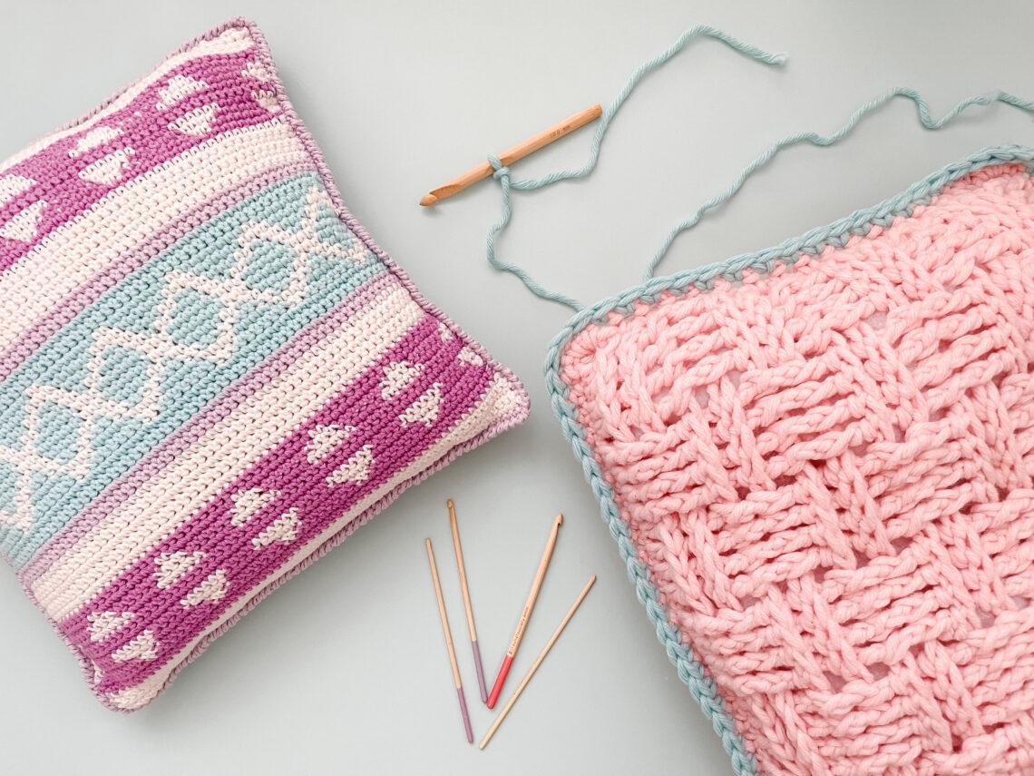 two crochet cushions
