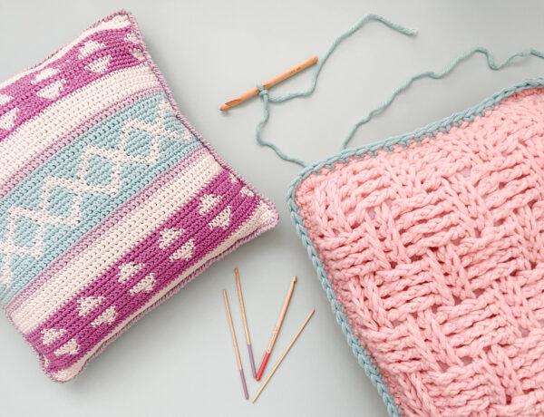 two crochet cushions