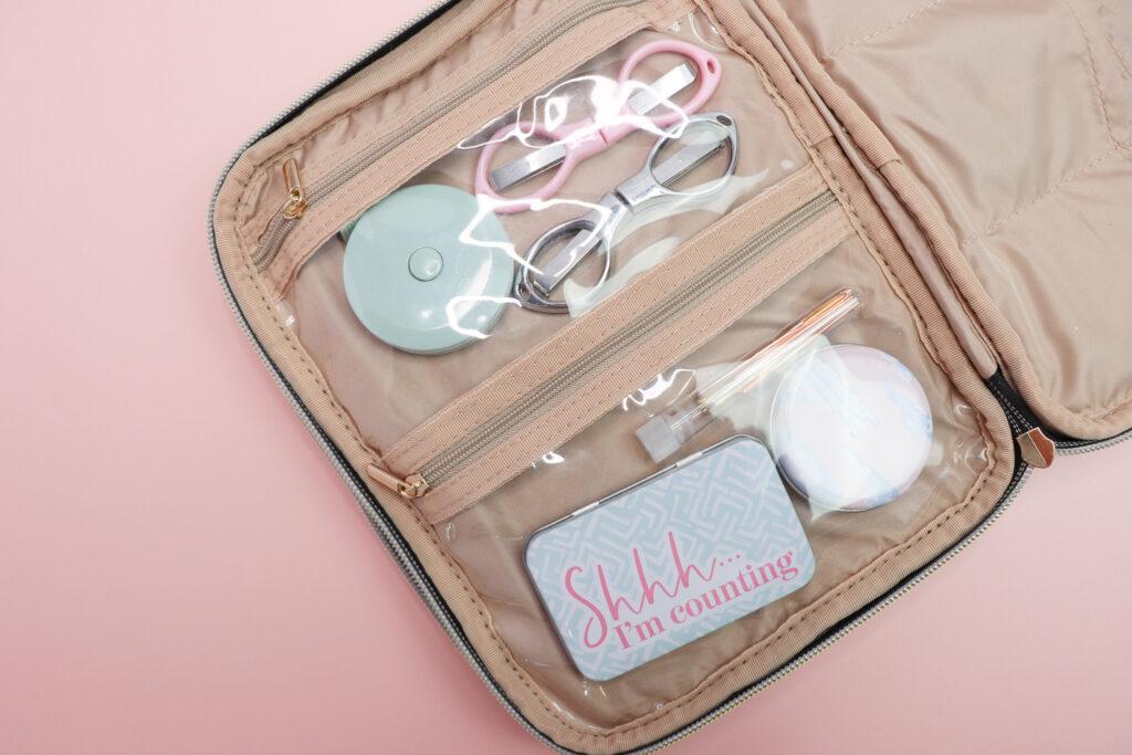 crochet accessories inside a crochet storage case in two clear dupable compartments to give an idea of how to travel with your crochet. 