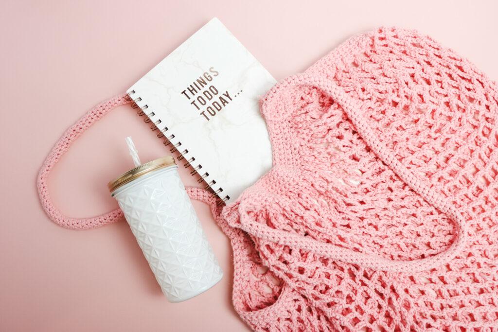 pink crochet mesh bag.